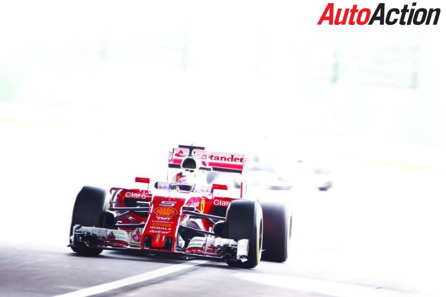 Sebastian Vettel racing at Suzuka - Photo: LAT