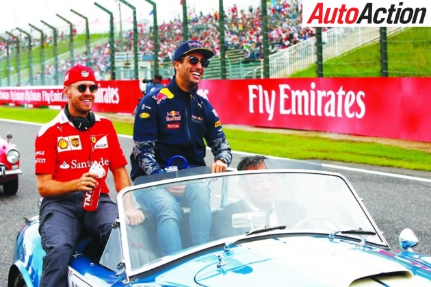 Former team mates Sebastian Vettel and Daniel Ricciardo - Photo: LAT