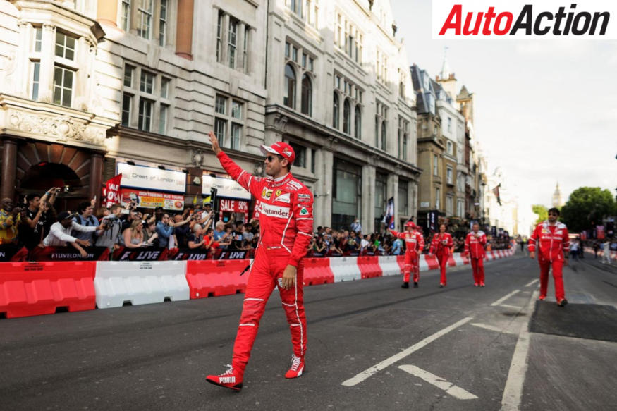 Sebastian Vettel waving to the crowd - Photo: LAT