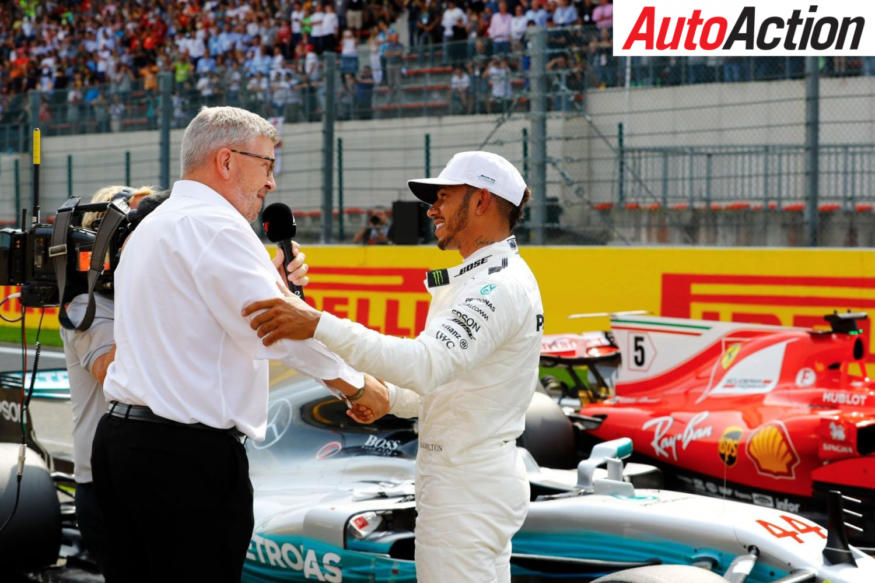 Ross Brawn congratulates Lewis Hamilton on his record equalling 68th Pole - Photo: LAT