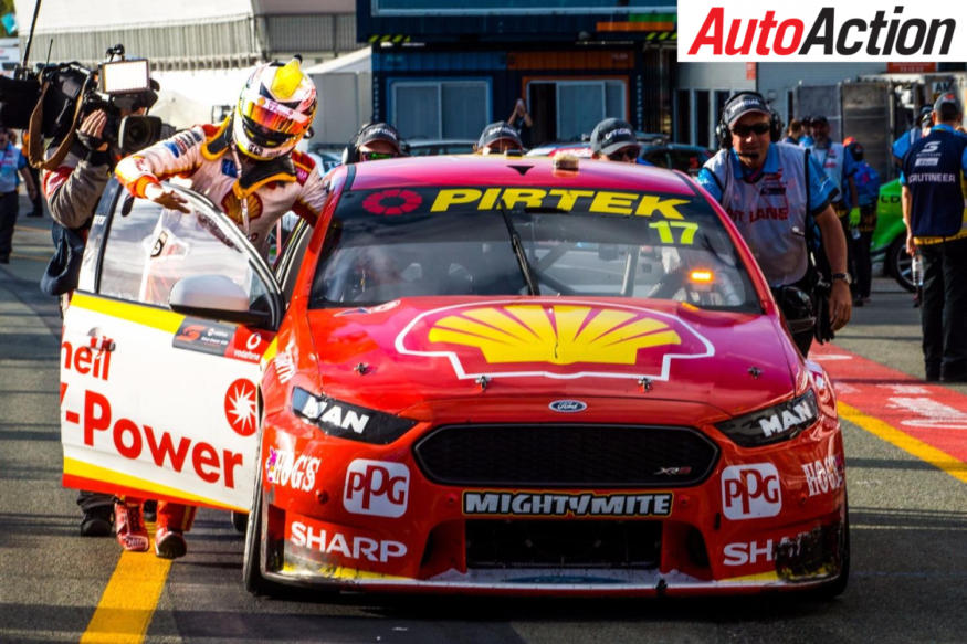 Scott McLaughlin pushing his car back after running out of fuel - Photo: Dirk Klynsmith