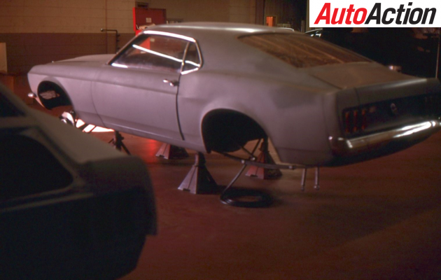 Moffat's car in it's grey undercoat at Bud Moore Racing in 1969