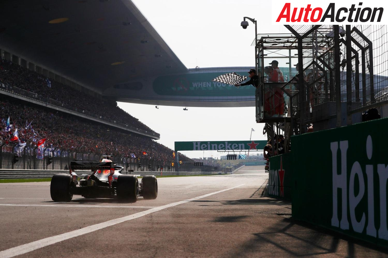 Ricciardo crosses the line after victory. Photo: LAT