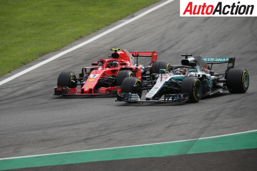 Lewis Hamilton battling with Kimi Raikkonen for the lead of the Italian Grand Prix - Photo: Suttons Images