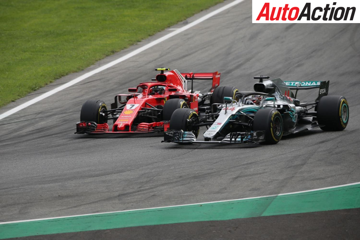 Lewis Hamilton battling with Kimi Raikkonen for the lead of the Italian Grand Prix - Photo: Suttons Images