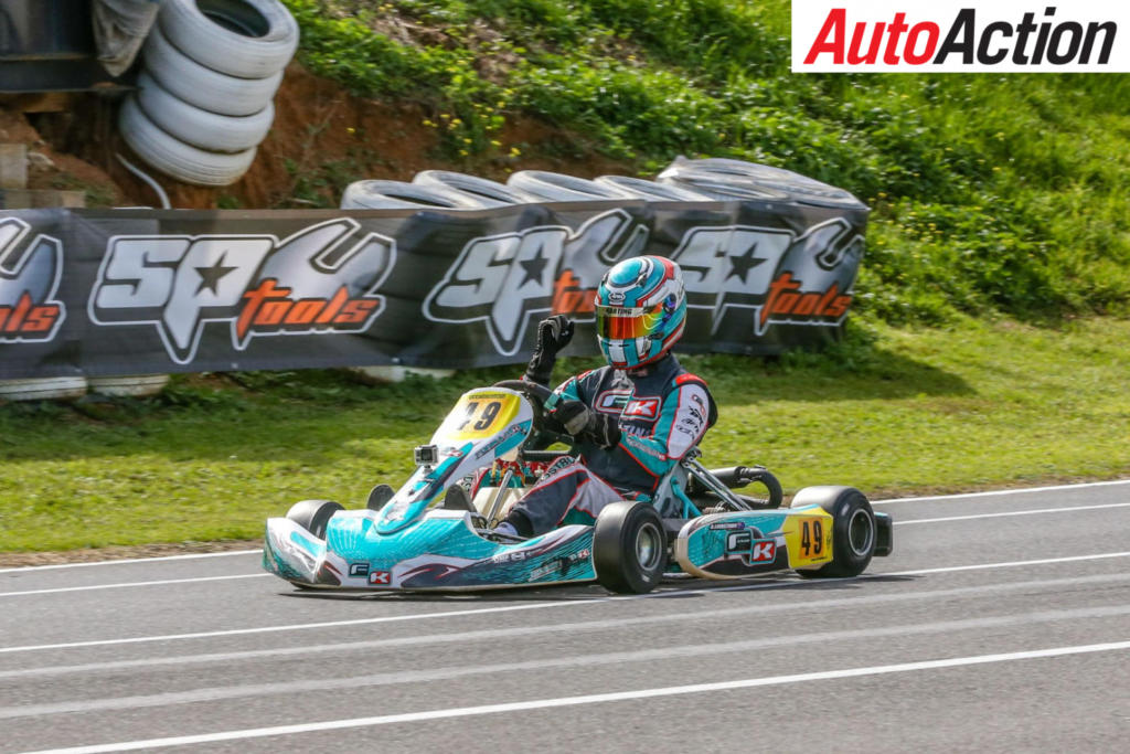 Adam Lindstrom breaking through for victory in the TaG 125 Class - Photo: Pace Images