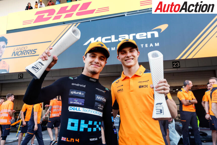 Lando Norris and Oscar Piastri celebrate as McLaren team mates following their double podium at the Japanese GP.