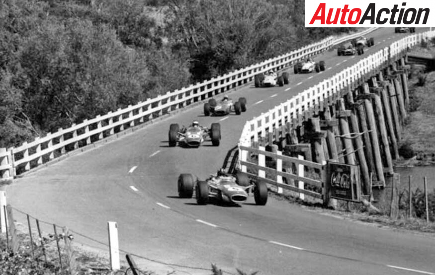 The Lotuses of Graham Hill and Jim Clark and the Dino Ferrari of Chris Amon lead the Tasman Series field off Long Bridge during the last Longford event in 1968. Image: SUPPLIED