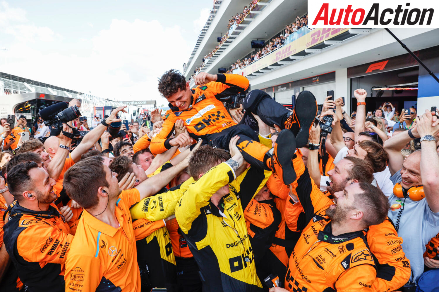 Lando Norris celebrating his maiden win with the McLaren racing team
