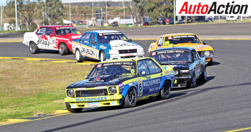 Ryan Hansford in a Torana in the battle for the lead in the Touring Car Masters Race at Sydney Motorsport-Image James Smith