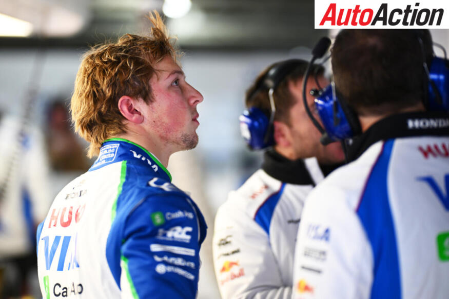 SUZUKA, JAPAN - APRIL 05: Fourteenth placed qualifier Liam Lawson of New Zealand and Visa Cash App Racing Bulls looks on in the garage during qualifying ahead of the F1 Grand Prix of Japan at Suzuka Circuit on April 05, 2025 in Suzuka, Japan.