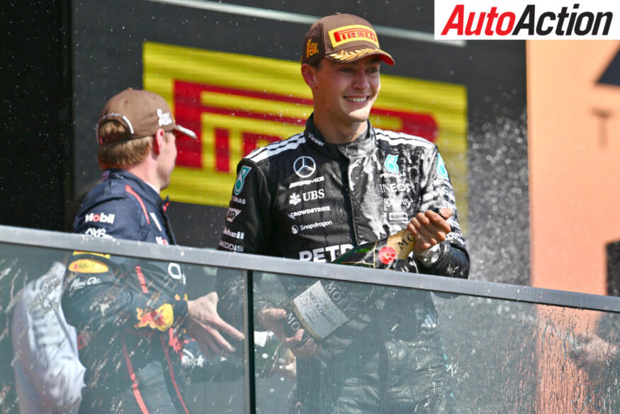 Race winner George Russell, Mercedes AMG Petronas F1 Team, celebrates on the podium after the 2025 F1 Canadian Grand Prix.