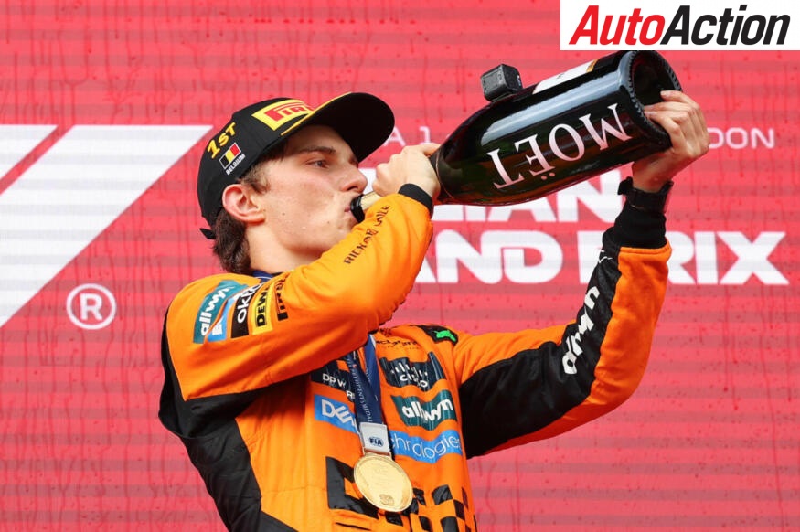 Oscar Piastri, McLaren, celebrates on the podium after winning the 2025 F1 Belgian Grand Prix.