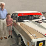 John Sheppard with Great Grandson and the restored HJ Monaro he built