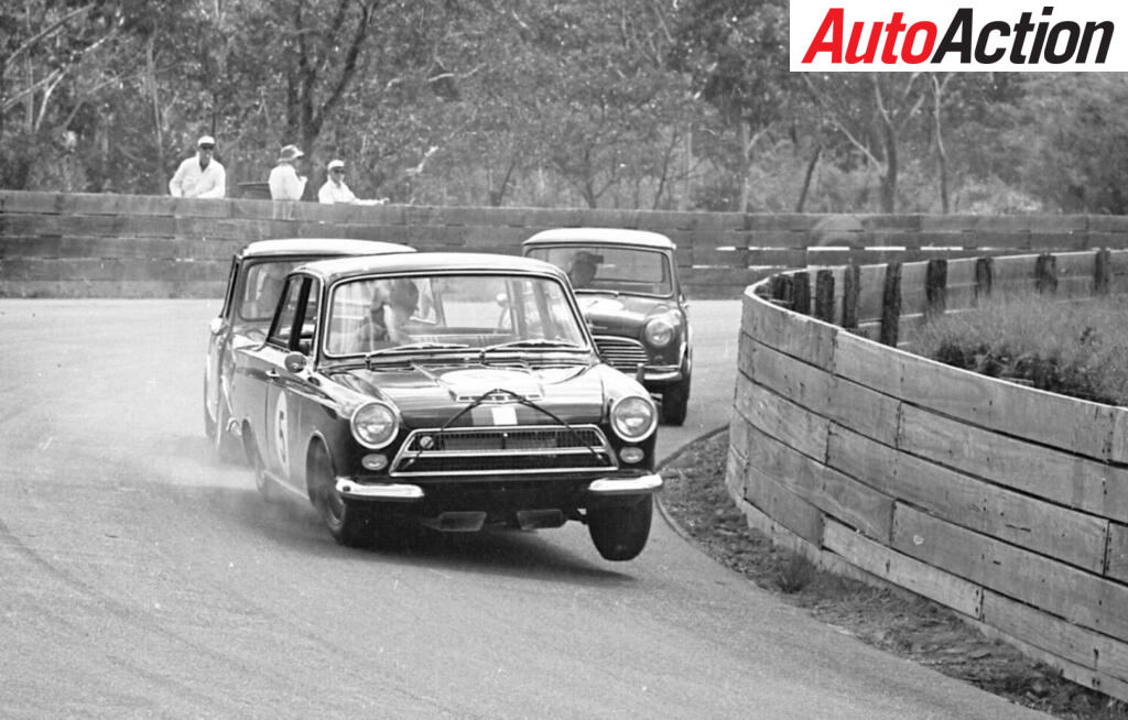 Pete 'Ian' Geoghegan three wheels his Lotus Cortina at Catalina Park, in the Blue Mountains 1964