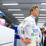 Liam Lawson, Visa Cash App Racing Bulls, looks on in the garage during Sprint Qualifying ahead of the 2025 F1 Belgian Grand Prix.