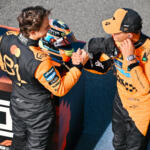 Oscar Piastri and Lando Norris, McLaren, congratulate each other after qualifying 1-2 at the 2025 F1 Dutch Grand Prix.
