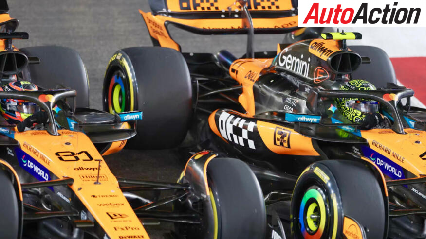 Oscar Piastri and Lando Norris, McLaren, race wheel-to-wheel during the 2025 F1 Singapore Grand Prix.