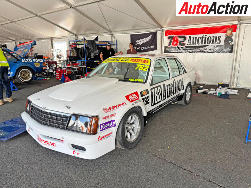 The Bendigo Retro built VB Commodore with some signage in the pit ...