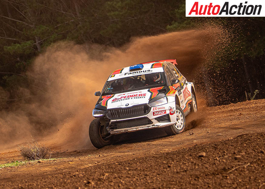 Scott Pedder and Glenn Macneall driving their Skoda Fabia RS Rally2 through a forest stage in Western Australia